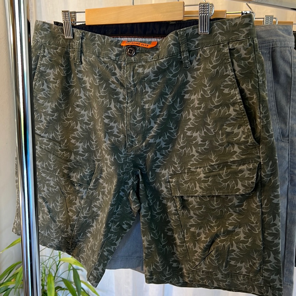 Two items: Volcom gray, Supreme flex gray/green shorts